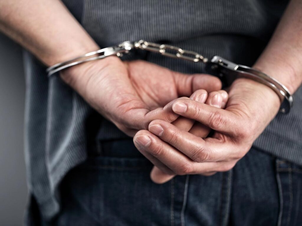 Arrested man in handcuffs